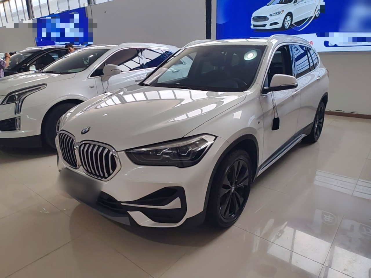 BMW X1 2021 — фото 1